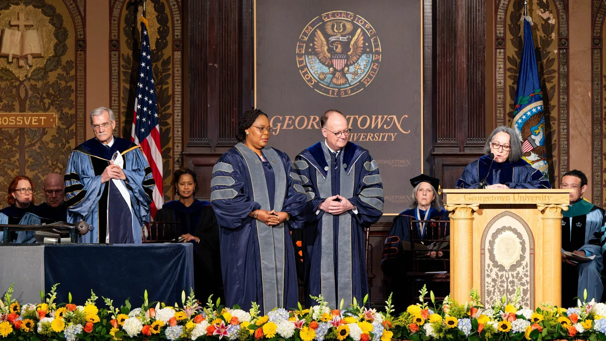 Georgetown leaders presenting a degree