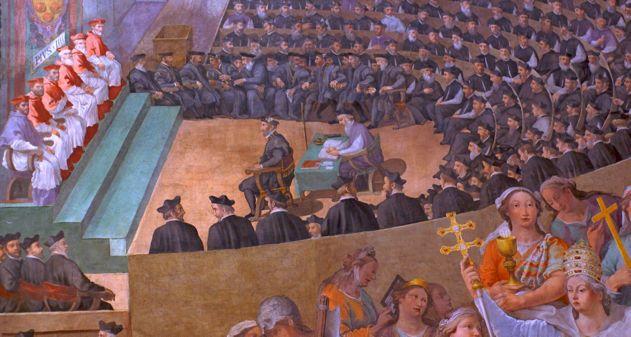 Painting illustrating a scene from the Reformation, where a man is seated before a row of clergy men in red robes. Behind the man is a large audience, seated in an arena-like setting.