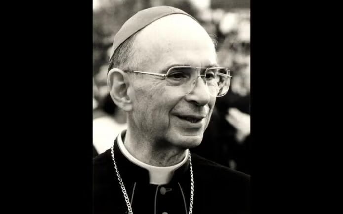 Black and white photo of Joseph Cardinal Bernardin, an older man with glasses wearing Catholic cardinal wear.